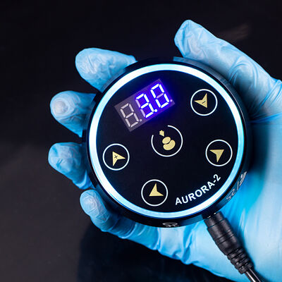 Vente en gros Nouveau affichage LCD numérique à écran tactile Mini Aurora 2 Tétée alimentation électrique Adapté à toutes les machines de tatouage fournisseur